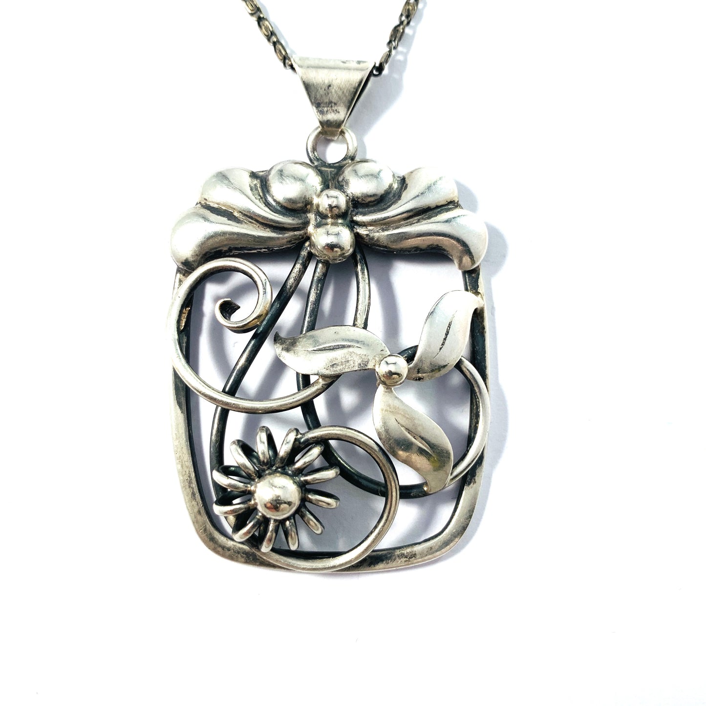 Stockholm, Sweden 1946. Mid Century Solid Silver Floral Pendant Necklace