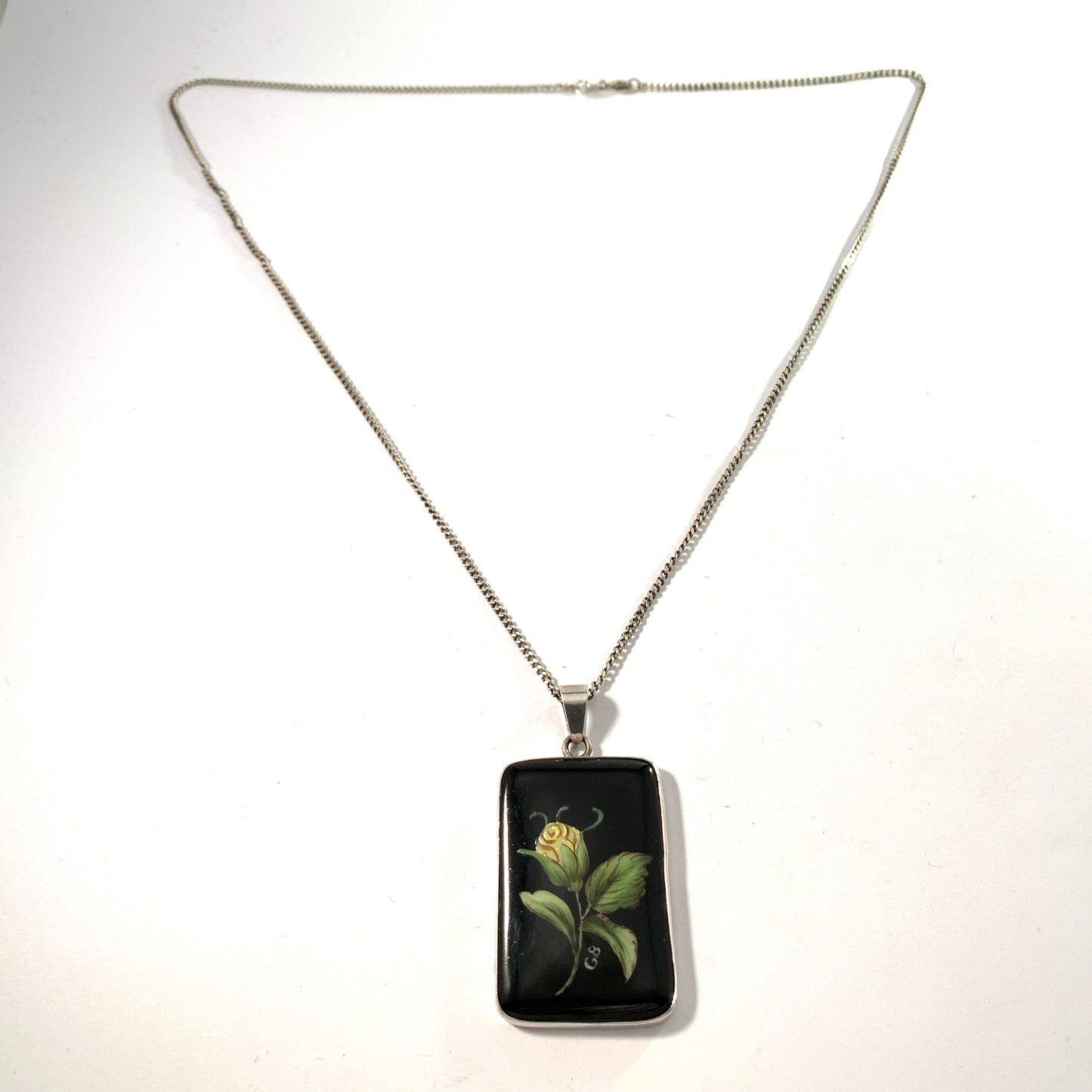 Hugo Olsson, Sweden 1974. Solid Silver Painted Porcelain Pendant Necklace.