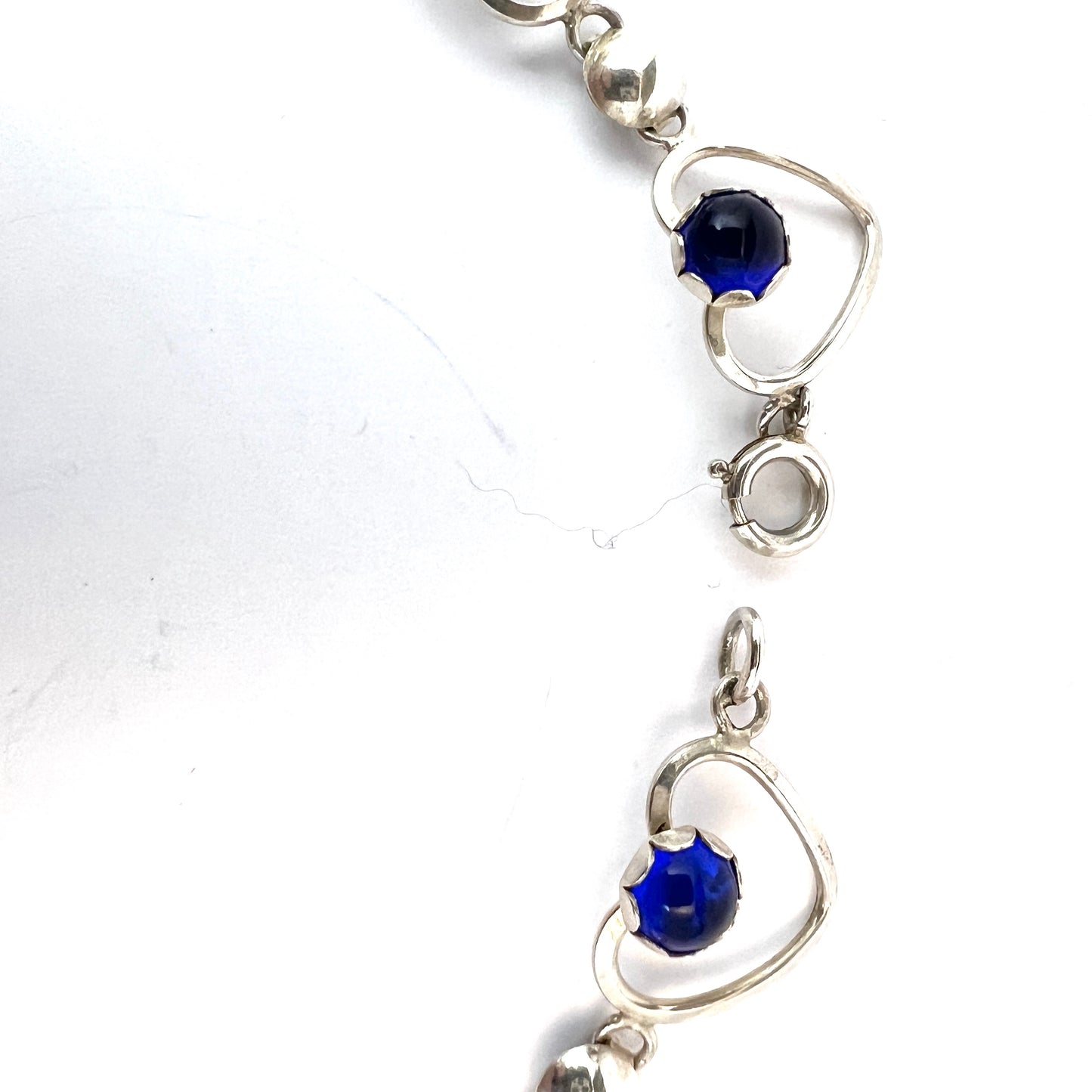 Sweden 1950s. Solid Silver Intense Blue Synthetic Stones Heart Necklace.