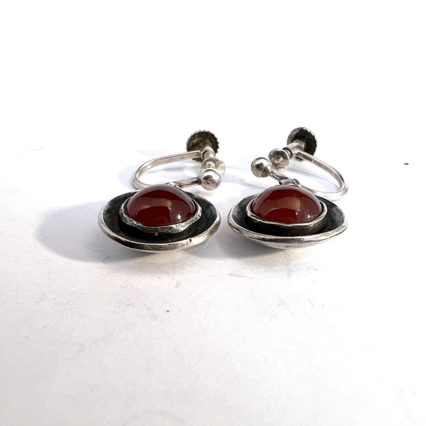 Mats Fors, Sweden 1954. Solid Silver Carnelian Earrings.