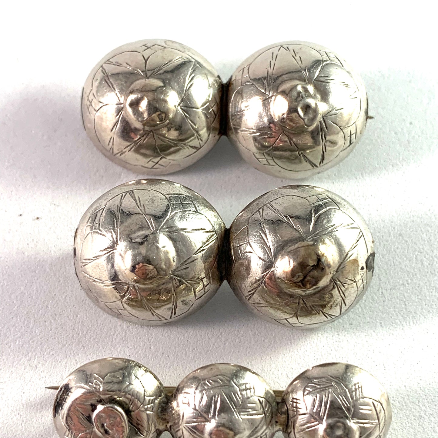G Dahlgren, Sweden Victorian mid 1800s Solid Silver Set of Traditional Scandinavian Button Brooches.