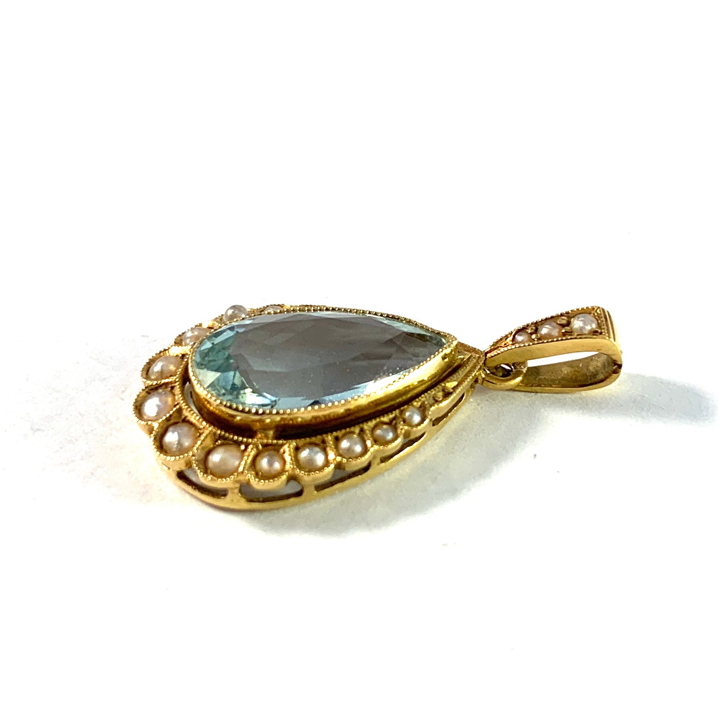 Eastern Europe Early 1900s. 18k Gold Topaz Seed Pearl Pendant.