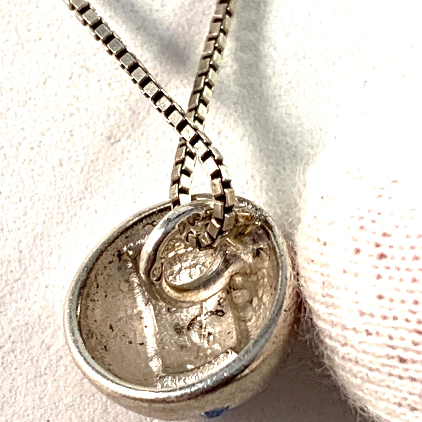 Yves Saint Laurent, France Sterling Silver Pendant Necklace.