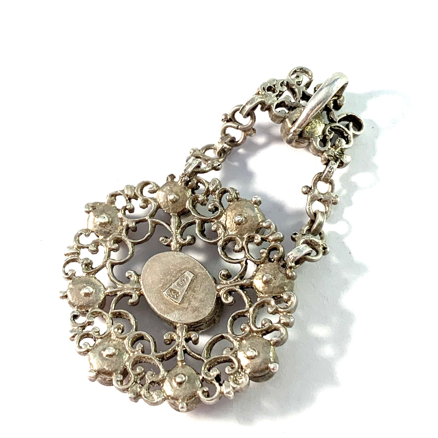 Austria / Germany early 1900s. Solid Silver M o P Foiled Back Paste Pendant.