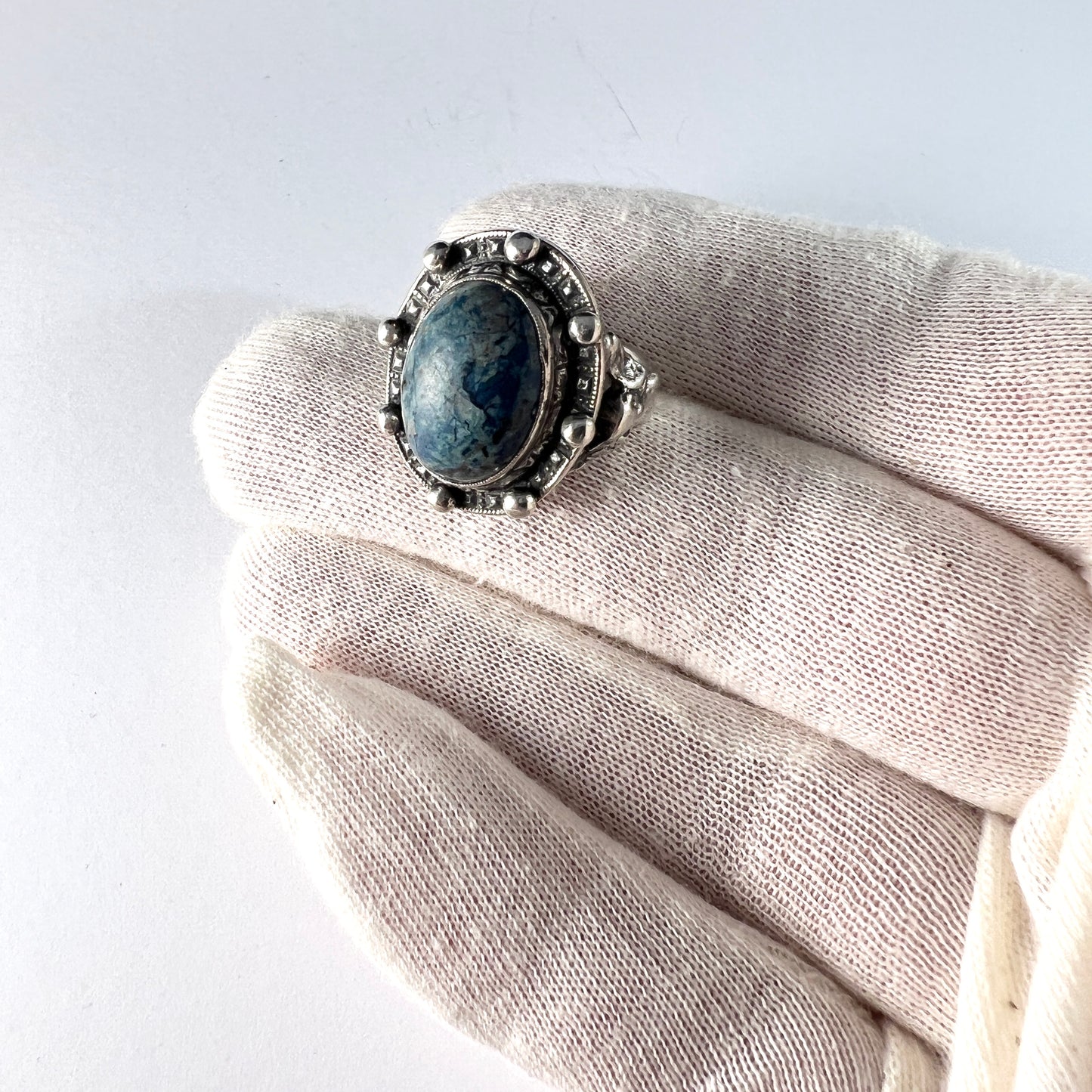 Maker CINI. Vintage Sterling Silver Blue Hardstone Woman on Shoulders Ring.