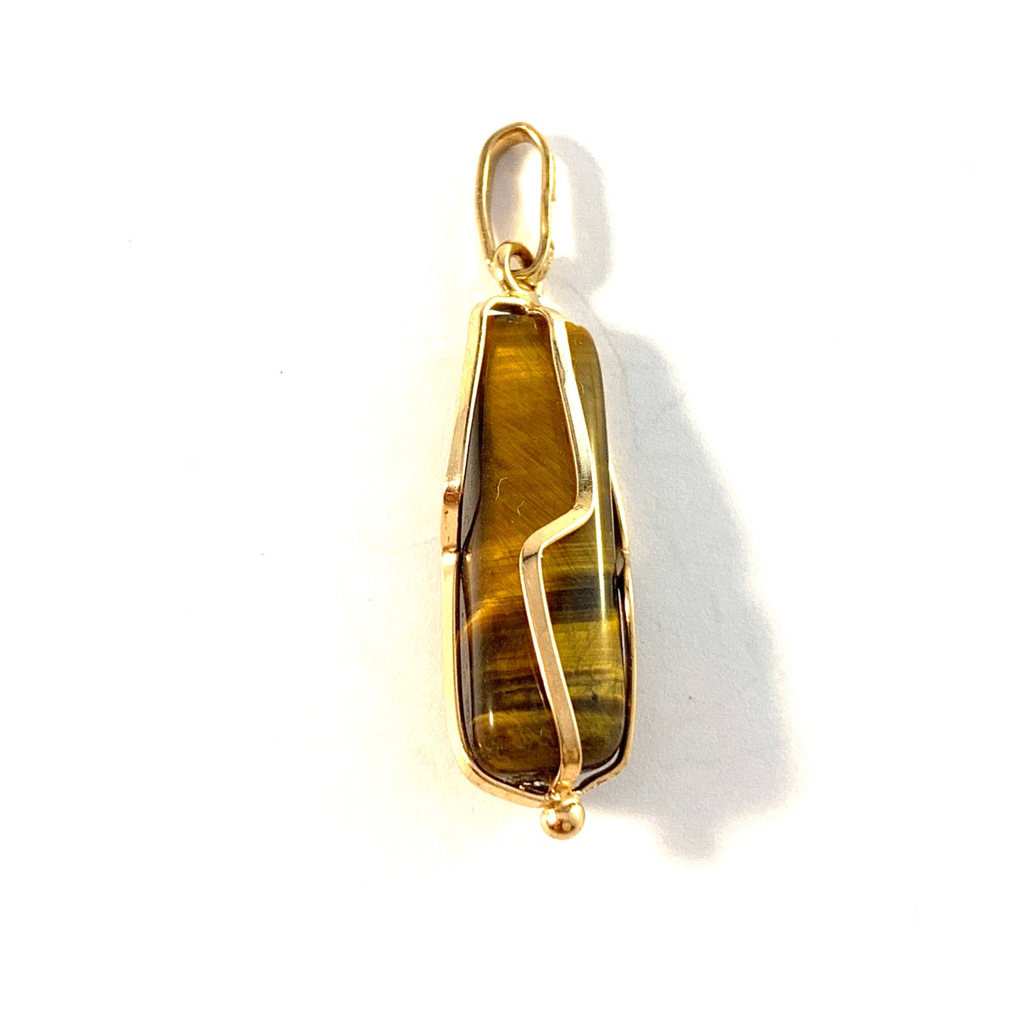 Umeå, Sweden year 1953. Vintage 18k Gold Tiger Eye Pendant.