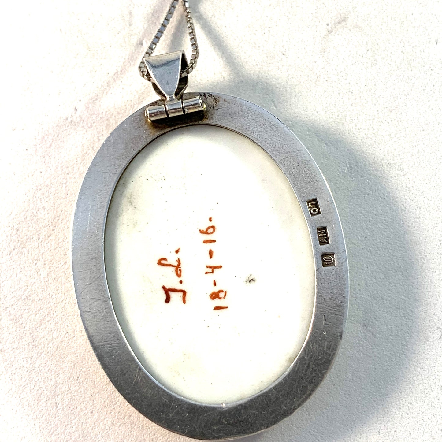 A Nilsson, father of Wiwen Nilsson, Sweden year 1916 Silver Painted Porcelain Pendant.
